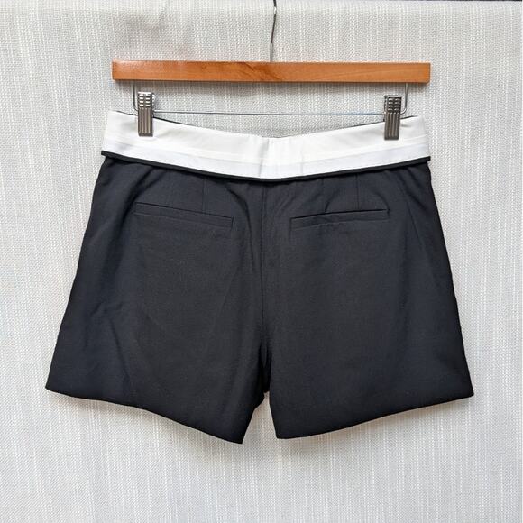 NWT Babaton Bureau Black Mid-rise Wool Twill Pleated Mini Shorts, size 2 - Picture 2 of 9